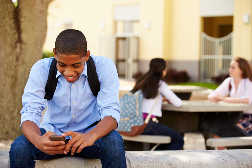 young lad on phone