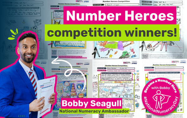 Photo of Bobby Seagull in front of the winning competition entries, with text saying "Number Heroes competition winners!"