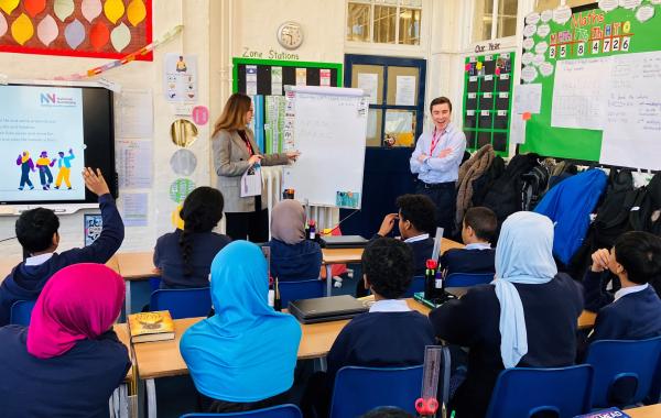 A volunteer leading a class session